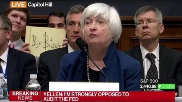 July 2017: Birth of an iconic meme. “Bitcoin Sign Guy” Christian Langalis photobombs Janet Yellen
